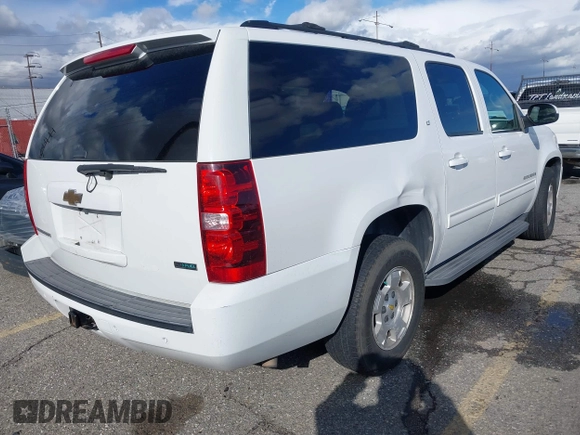2010 Chevrolet Suburban LT with VIN 1GNUCJE05AR210539, listed as a IAAI auction lot 41805107 with 166,305 mi miles and . Bid and sale history available at DreamBid. Image 4.
