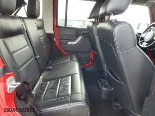 2012 Jeep Wrangler Unlimited Sahara with VIN 1C4BJWEGXCL223261, listed as a Copart auction lot 49350525 with 153,256 mi miles and Salvage Title. Bid and sale history available at carsss.com. Image 11.