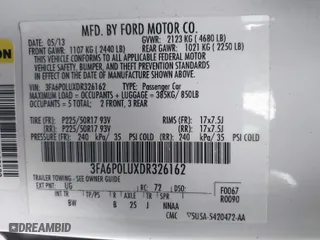 2013 Ford Fusion SE Hybrid with VIN 3FA6P0LUXDR326162, listed as a IAAI auction lot 41538999 with 148,112 mi miles. Bid and sale history available at carsss.com. Image 9.