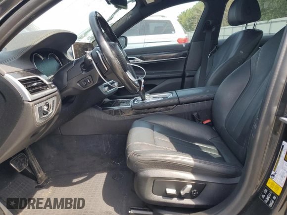 2019 BMW 7 Series 740i xDrive z VIN WBA7E4C56KGV71028, wystawiony jako Copart lot #76860474 z przebiegiem 66 657 mil mil oraz Nie do naprawy • Non repairable. Historia ofert i sprzedaży dostępna na DreamBid. Obrazek 7.
