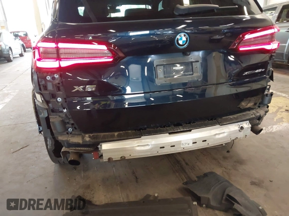 2022 BMW X5 xDrive45e with VIN 5UXTA6C05N9L41274, listed as a IAAI auction lot 42247190 with 18,701 mi miles and . Bid and sale history available at DreamBid. Image 20.