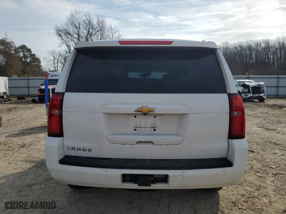 2019 Chevrolet Tahoe LT with VIN 1GNSKBKC8KR392771, listed as a Copart auction lot 46893785 with 125,161 mi miles and Salvage Title. Bid and sale history available at carsss.com. Image 6.