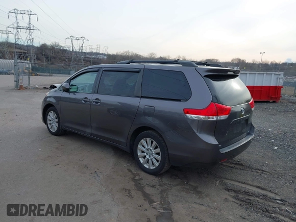2014 Toyota Sienna LE with VIN 5TDJK3DC1ES087626, listed as a IAAI auction lot 41610813 with 142,311 mi miles and . Bid and sale history available at DreamBid. Image 3.