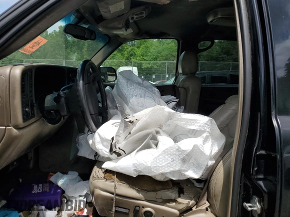 2004 Chevrolet Suburban LT with VIN 1GNFK16Z54J328473, listed as a Copart auction lot 60135565 with Not provided miles and Salvage title. Bid and sale history available at DreamBid. Image 7.