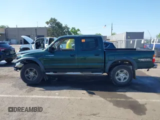 2003 Toyota Tacoma PreRunner z VIN 5TEGN92NX3Z208629, wystawiony jako IAAI lot #42149264 z przebiegiem Nie podano mil oraz . Historia ofert i sprzedaży dostępna na DreamBid. Obrazek 14.