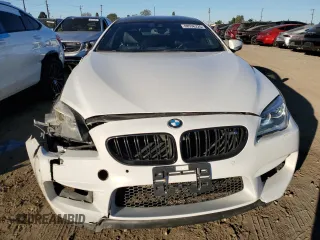 2016 BMW M6 z VIN WBS6E9C59GG437108, wystawiony jako Copart lot #88536225 z przebiegiem 63 891 mil mil oraz Szkoda całkowita • Salvage title. Historia ofert i sprzedaży dostępna na DreamBid. Obrazek 5.