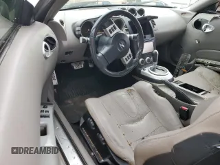 2006 Nissan 350Z Touring z VIN JN1AZ36A86M456456, wystawiony jako Copart lot #59199645 z przebiegiem 109 682 mil mil oraz Szkoda całkowita • Salvage title. Historia ofert i sprzedaży dostępna na DreamBid. Obrazek 8.