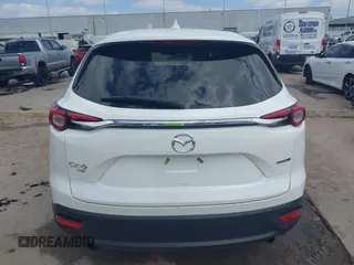 2022 Mazda CX-9 Touring with VIN JM3TCBCY0N0608052, listed as a IAAI auction lot 42027465 with 65,313 mi miles and . Bid and sale history available at DreamBid. Image 16.
