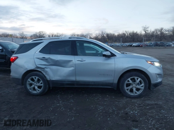 2019 Chevrolet Equinox Premier with VIN 2GNAXXEV1K6244691, listed as a IAAI auction lot 41164317 with 89,604 mi miles and . Bid and sale history available at DreamBid. Image 13.