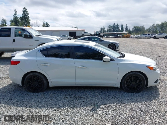 2014 Acura ILX Premium with VIN 19VDE1F54EE010386, listed as a IAAI auction lot 42587225 with 145,613 mi miles and . Bid and sale history available at DreamBid. Image 13.