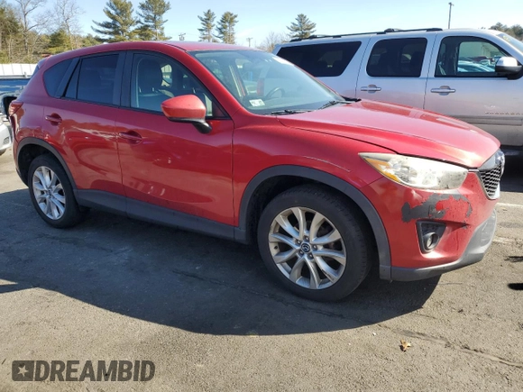 2014 Mazda CX-5 Grand Touring with VIN JM3KE4DY8E0421660, listed as a Copart auction lot 48588525 with 144,939 mi miles and Salvage Title. Bid and sale history available at DreamBid. Image 4.