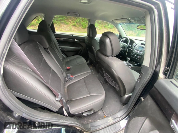2015 Kia Sorento LX with VIN 5XYKTCA65FG612606, listed as a Copart auction lot 65296225 with Not provided miles and Clean title. Bid and sale history available at DreamBid. Image 6.