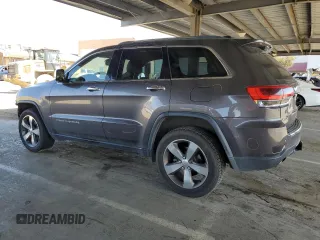2014 Jeep Grand Cherokee Limited with VIN 1C4RJFBG7EC588986, listed as a Copart auction lot 52284405 with 92,702 mi miles and Salvage Title. Bid and sale history available at DreamBid. Image 2.