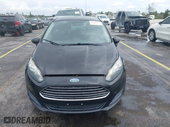 2014 Ford Fiesta S z VIN 3FADP4AJ9EM104704, wystawiony jako IAAI lot #42016647 z przebiegiem 81 826 mil mil oraz . Historia ofert i sprzedaży dostępna na DreamBid. Obrazek 6.