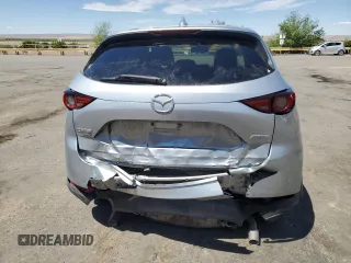 2018 Mazda CX-5 Grand Touring with VIN JM3KFBDM3J0319157, listed as a Copart auction lot 53891095 with 133,189 mi miles and Salvage Title. Bid and sale history available at DreamBid. Image 6.