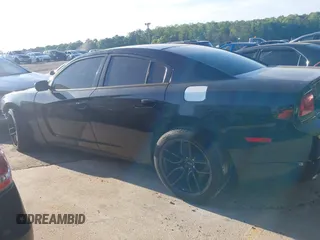 2014 Dodge Charger Police z VIN 2C3CDXAT3EH121230, wystawiony jako IAAI lot #42025638 z przebiegiem 48 224 mil mil oraz . Historia ofert i sprzedaży dostępna na DreamBid. Obrazek 13.
