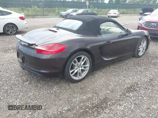 2014 Porsche Boxster with VIN WP0CA2A81ES121030, listed as a IAAI auction lot 42690064 with 47,257 mi miles and . Bid and sale history available at DreamBid. Image 4.