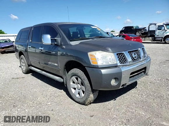 2005 Nissan Titan LE with VIN 1N6BA07B95N571880, listed as a Copart auction lot 57527435 with 199,577 mi miles and Salvage title. Bid and sale history available at DreamBid. Image 13.
