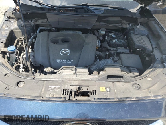 2018 Mazda CX-5 Touring with VIN JM3KFBCMXJ0460020, listed as a Copart auction lot 55997305 with 56,361 mi miles and Salvage Title. Bid and sale history available at DreamBid. Image 12.