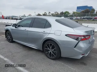 2023 Toyota Camry SE with VIN 4T1G11AKXPU809876, listed as a IAAI auction lot 42100546 with 35,055 mi miles and . Bid and sale history available at DreamBid. Image 3.