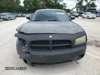 2009 Dodge Charger SE z VIN 2B3KA43DX9H530580, wystawiony jako Copart lot #58381375 z przebiegiem 300 292 mil mil oraz Szkoda całkowita • Salvage title. Historia ofert i sprzedaży dostępna na DreamBid. Obrazek 5.