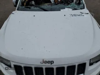 2015 Jeep Grand Cherokee Overland with VIN 1C4RJFCG8FC174325, listed as a Copart auction lot 51074475 with Not Provided miles and Salvage Title. Bid and sale history available at carsss.com. Image 13.