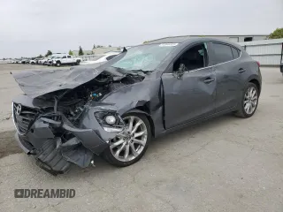 2016 Mazda 3 S Touring with VIN JM1BM1M3XG1299797, listed as a Copart auction lot 54344485 with Not provided miles and Salvage title. Bid and sale history available at DreamBid. Image 1.