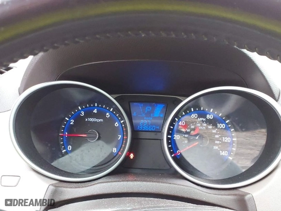 2012 Hyundai Tucson Limited with VIN KM8JU3AC1CU534989, listed as a IAAI auction lot 41513858 with 133,660 mi miles. Bid and sale history available at carsss.com. Image 7.