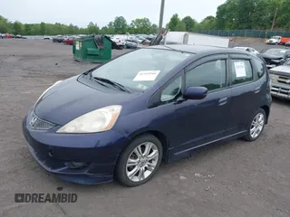 2009 Honda Fit Sport z VIN JHMGE87679S043551, wystawiony jako IAAI lot #42353546 z przebiegiem 156 143 mil mil oraz . Historia ofert i sprzedaży dostępna na DreamBid. Obrazek 2.