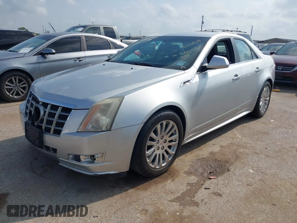 2012 Cadillac CTS Performance z VIN 1G6DJ5E37C0145221, wystawiony jako IAAI lot #42111935 z przebiegiem 82 103 mil mil oraz . Historia ofert i sprzedaży dostępna na DreamBid. Obrazek 2.