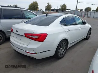 2016 Kia Cadenza Premium with VIN KNALN4D77G5218198, listed as a IAAI auction lot 40381356 with 77,116 mi miles. Bid and sale history available at carsss.com. Image 4.