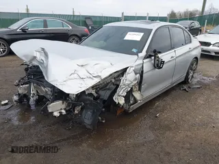 2013 BMW 3 Series 335i xDrive with VIN WBA3B9G52DNR90099, listed as a IAAI auction lot 41195265 with 116,320 mi miles and . Bid and sale history available at DreamBid. Image 2.