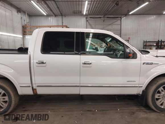 2012 Ford F-150 XL z VIN 1FTFW1CT7CFA05296, wystawiony jako IAAI lot #41976855 z przebiegiem 220 071 mil mil oraz . Historia ofert i sprzedaży dostępna na DreamBid. Obrazek 14.