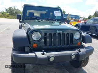 2010 Jeep Wrangler Sport with VIN 1J4AA2D17AL126737, listed as a IAAI auction lot 42237596 with 119,391 mi miles and . Bid and sale history available at carsss.com. Image 12.