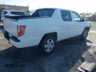 2013 Honda Ridgeline RTL with VIN 5FPYK1F50DB003971, listed as a IAAI auction lot 41946344 with 240,051 mi miles. Bid and sale history available at carsss.com. Image 4.