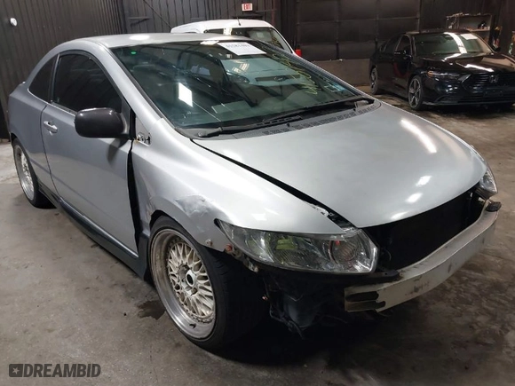 2007 Honda Civic Cpe LX with VIN 2HGFG11647H514388, listed as a IAAI auction lot 41581403 with 140,669 mi miles. Bid and sale history available at carsss.com. Image 1.