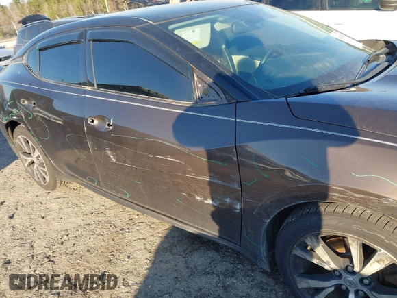 2016 Nissan Maxima Platinum with VIN 1N4AA6AP4GC434534, listed as a IAAI auction lot 41642540 with 143,413 mi miles and . Bid and sale history available at DreamBid. Image 18.