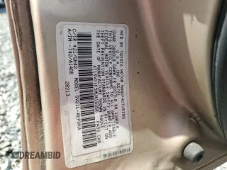 1991 Toyota Camry DLX z VIN 4T1SV21E5MU415356, wystawiony jako Copart lot #74465914 z przebiegiem 74 592 mil mil oraz Szkoda całkowita • Salvage title. Historia ofert i sprzedaży dostępna na DreamBid. Obrazek 13.
