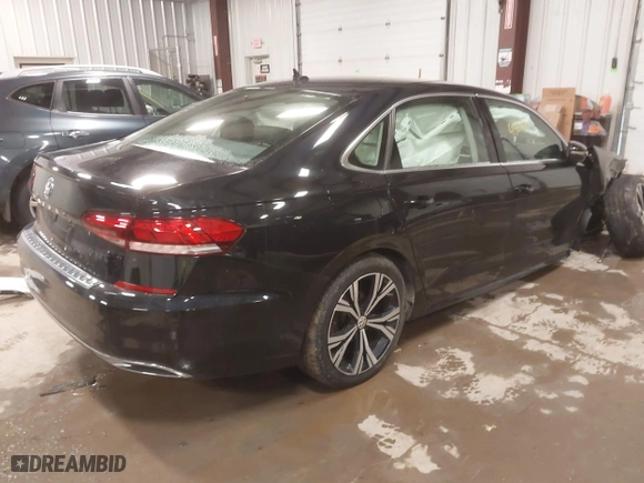 2021 Volkswagen Passat 2.0T SE with VIN 1VWSA7A30MC010553, listed as a IAAI auction lot 41581624 with 26,320 mi miles. Bid and sale history available at carsss.com. Image 4.