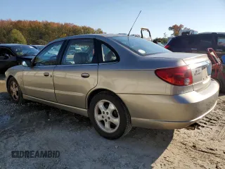 2003 Saturn LS z VIN 1G8JW54R93Y580275, wystawiony jako Copart lot #80853314 z przebiegiem 128 887 mil mil oraz Szkoda całkowita • Salvage title. Historia ofert i sprzedaży dostępna na DreamBid. Obrazek 2.