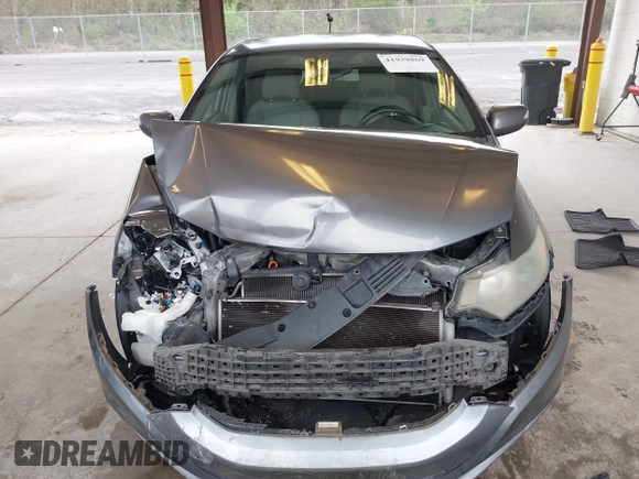 2010 Honda Insight EX with VIN JHMZE2H7XAS034098, listed as a IAAI auction lot 41939869 with 281,689 mi miles and . Bid and sale history available at DreamBid. Image 12.