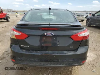 2013 Ford Focus SE z VIN 1FADP3F28DL292238, wystawiony jako Copart lot #51016715 z przebiegiem 165 699 mil mil oraz Szkoda całkowita • Salvage title. Historia ofert i sprzedaży dostępna na DreamBid. Obrazek 6.