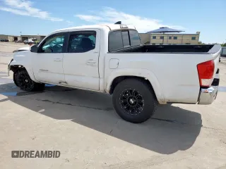 2017 Toyota Tacoma SR5 with VIN 3TMAZ5CN9HM052721, listed as a Copart auction lot 59791615 with 67,019 mi miles and Salvage title. Bid and sale history available at DreamBid. Image 2.