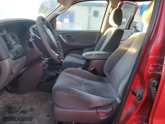 2003 Mazda Tribute LX with VIN 4F2YZ94153KM38084, listed as a Copart auction lot 87666995 with 191,546 mi miles and Salvage Title. Bid and sale history available at carsss.com. Image 7.