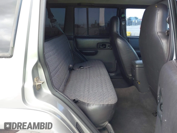 2000 Jeep Cherokee z VIN 1J4FF48S1YL200458, wystawiony jako IAAI lot #42239282 z przebiegiem Nie podano mil oraz . Historia ofert i sprzedaży dostępna na DreamBid. Obrazek 8.