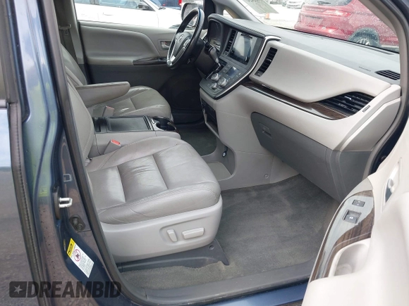 2015 Toyota Sienna XLE with VIN 5TDYK3DC1FS594123, listed as a IAAI auction lot 41944711 with 208,249 mi miles. Bid and sale history available at carsss.com. Image 5.