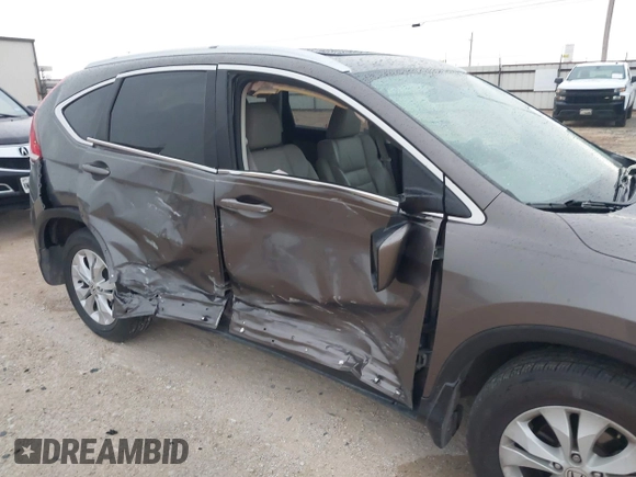 2014 Honda CR-V EX-L with VIN 2HKRM3H76EH512578, listed as a IAAI auction lot 42102989 with 84,235 mi miles and . Bid and sale history available at carsss.com. Image 6.