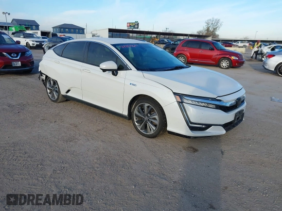 2018 Honda Clarity z VIN JHMZC5F14JC002263, wystawiony jako IAAI lot #41353651 z przebiegiem 153 401 mil mil oraz . Historia ofert i sprzedaży dostępna na DreamBid. Obrazek 1.