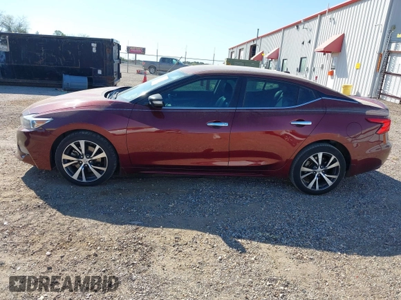 2016 Nissan Maxima Platinum z VIN 1N4AA6AP1GC416590, wystawiony jako IAAI lot #41817288 z przebiegiem 248 514 mil mil oraz . Historia ofert i sprzedaży dostępna na DreamBid. Obrazek 15.