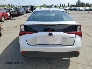 2021 Toyota Prius L Eco with VIN JTDKAMFUXM3130587, listed as a Copart auction lot 53167245 with 11,560 mi miles and Salvage title. Bid and sale history available at DreamBid. Image 6.